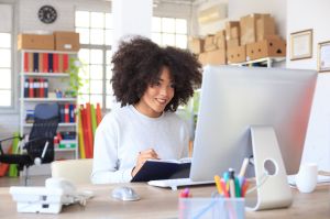 Smiling young woman at the office