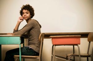 Student sitting at a desk in a classroom