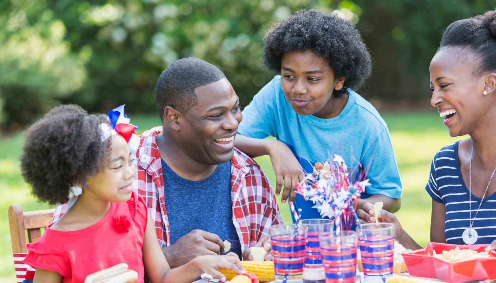 African American mixed race family at July 4th picnic