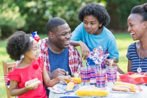 African American mixed race family at July 4th picnic