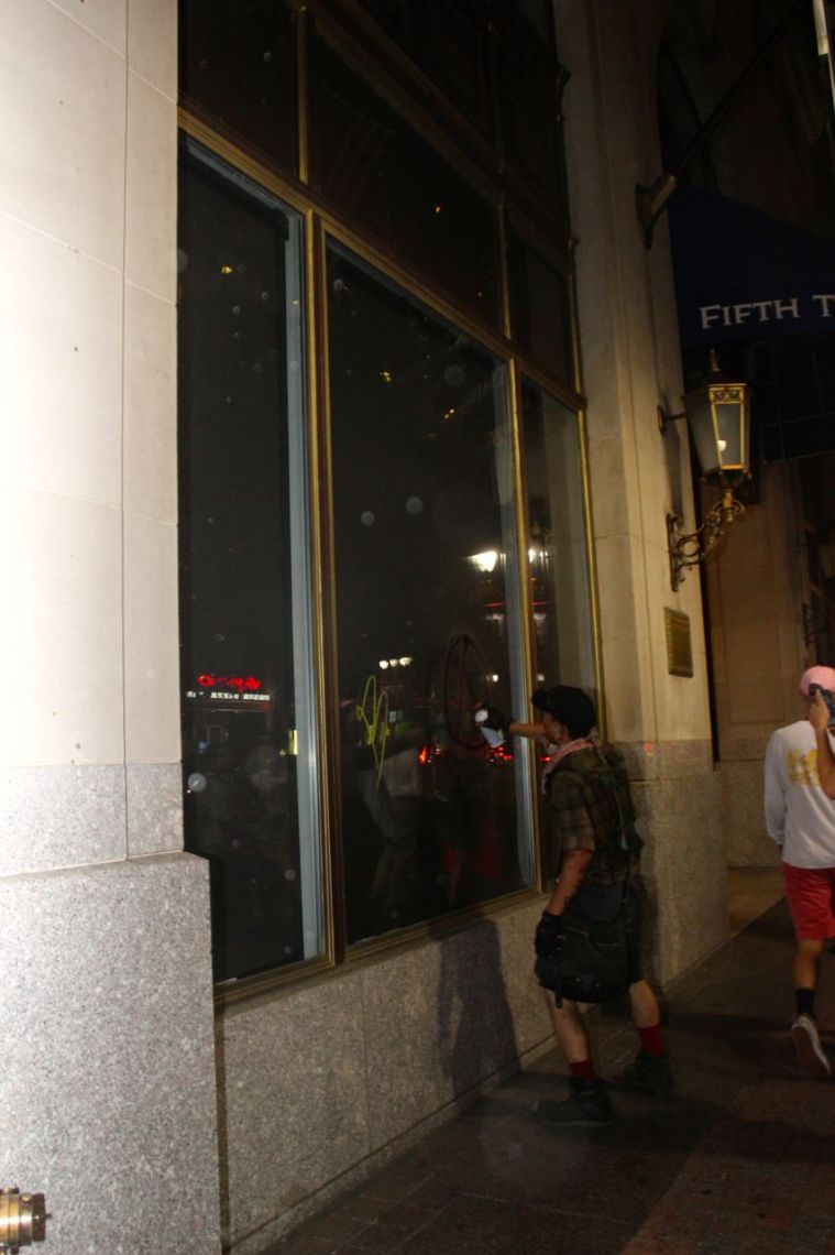 Tagger Defacing Property During Protests