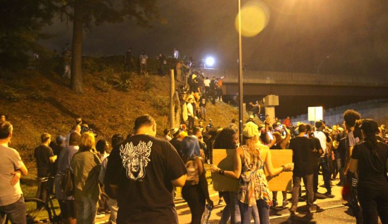 Protestors Try To Climb Onto I-277