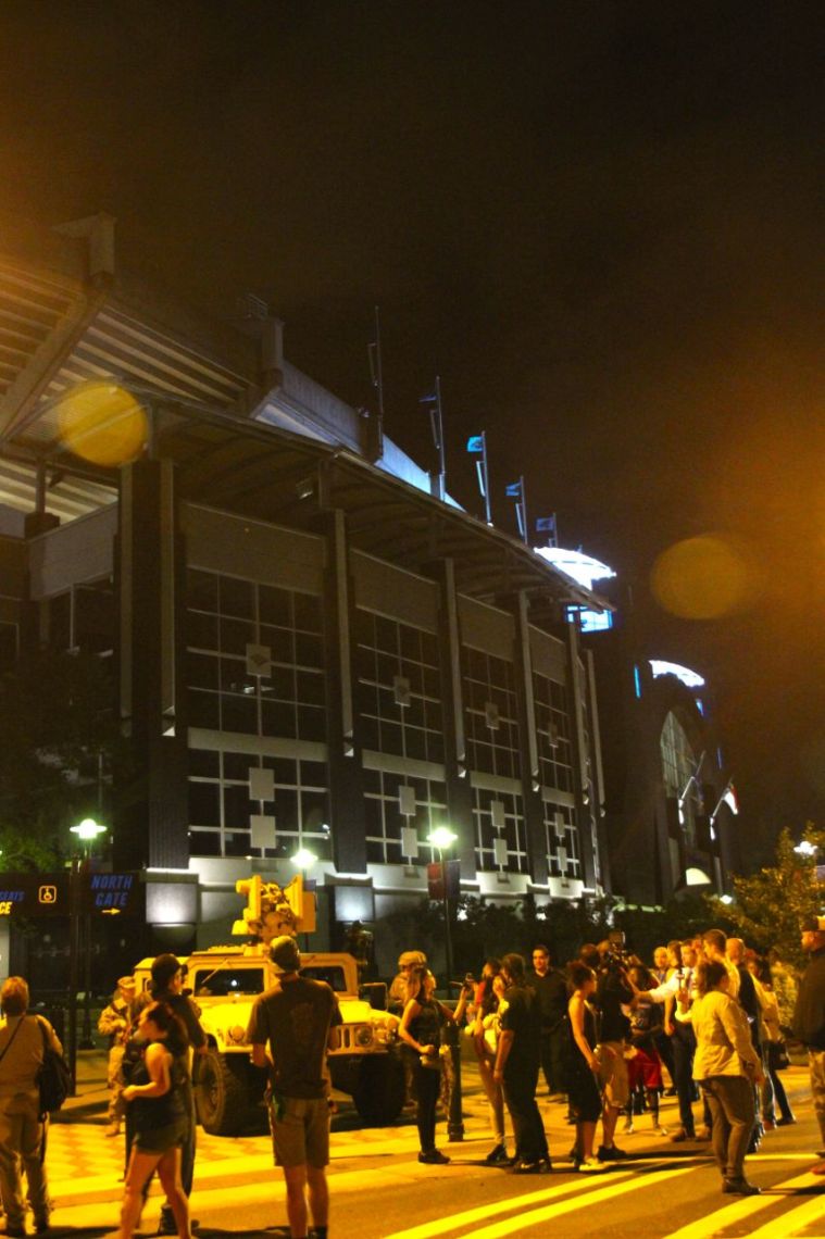 Protestors March To Bank of America Stadium