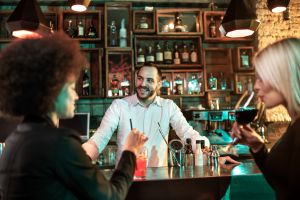 Bartender with customers