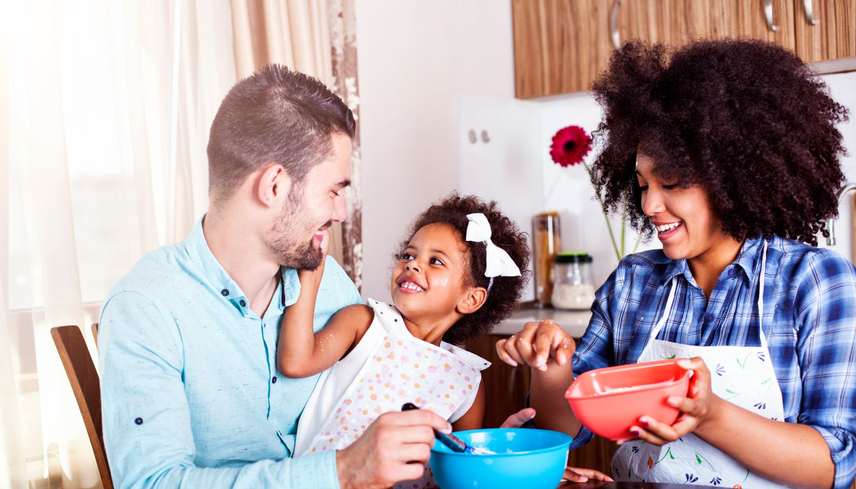 Young happy family baking together