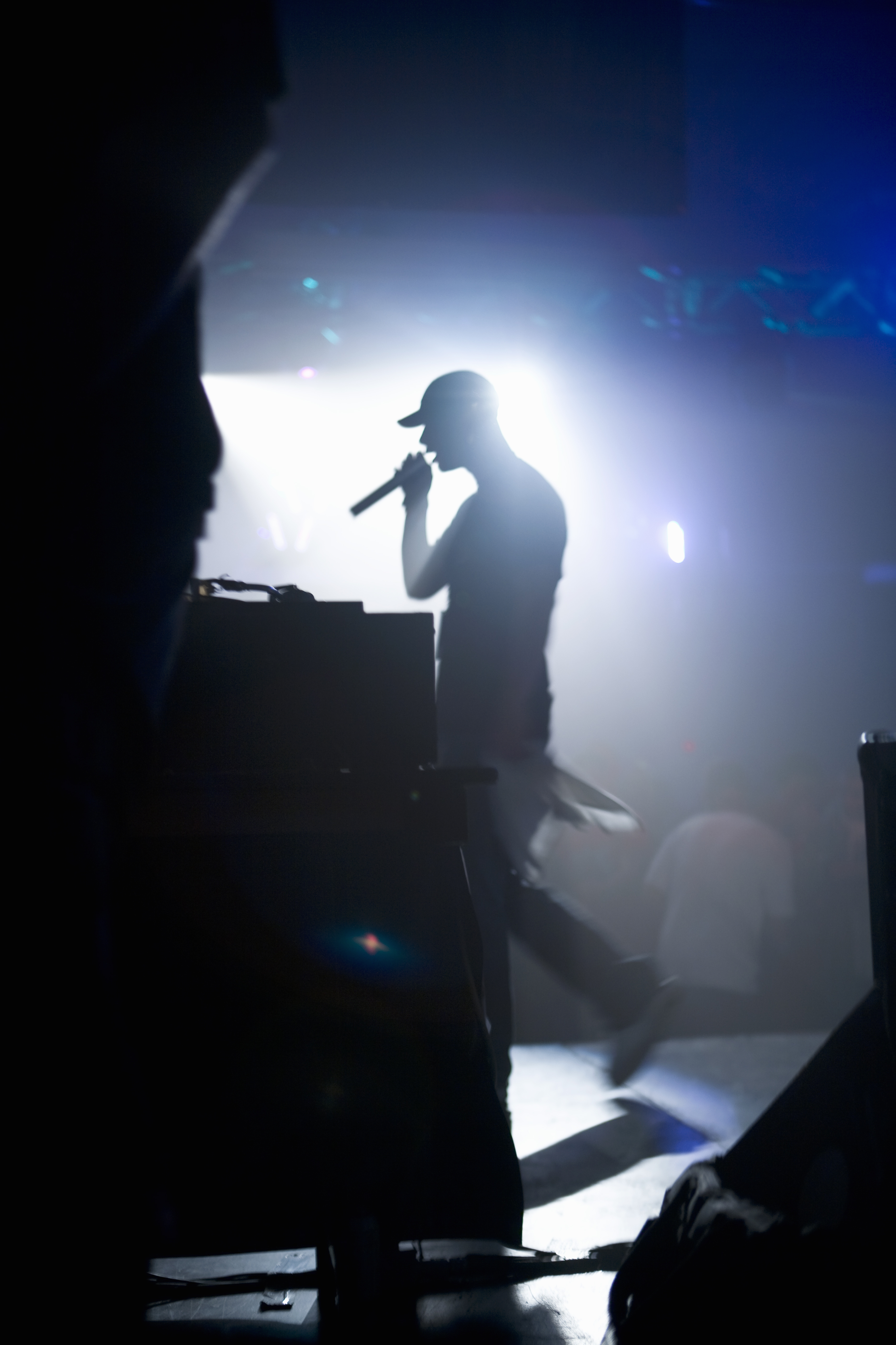 Silhouette of singer on stage