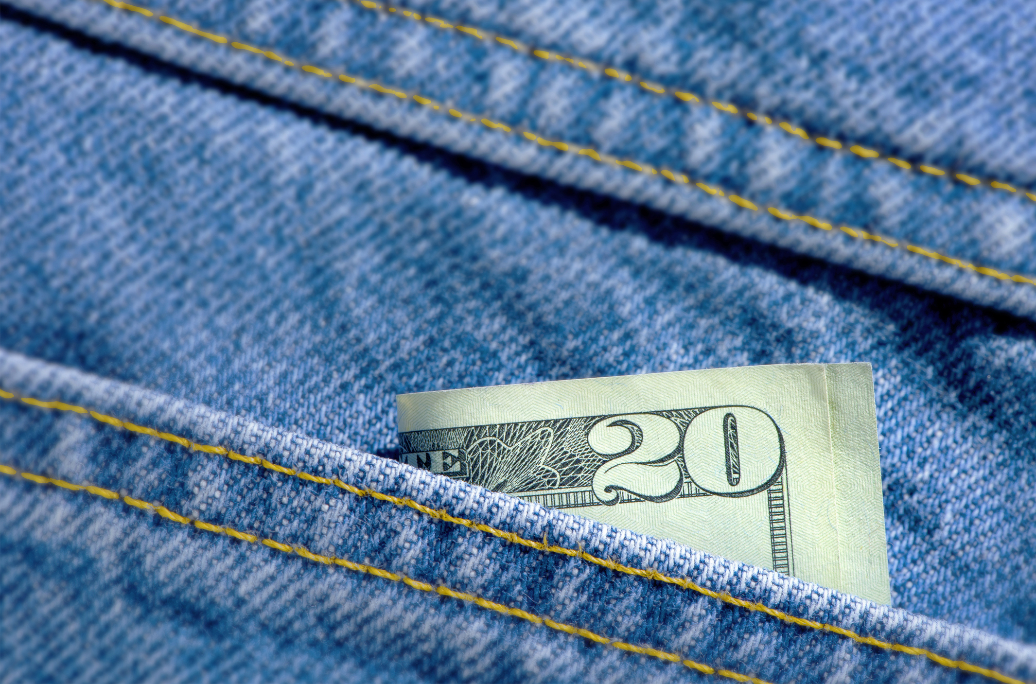 Cash in a jeans pocket