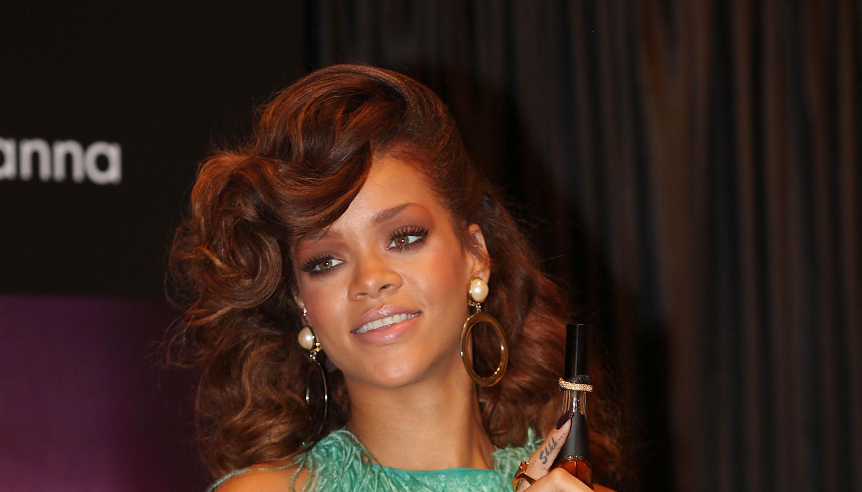 Rihanna Makes A Personal Appearance To Launch Her New Scent 'Reb'l Fleur'