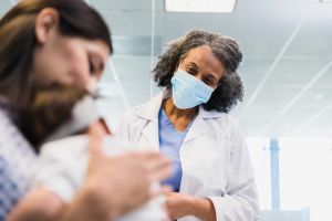 Low angle view with focus on emergency room doctor