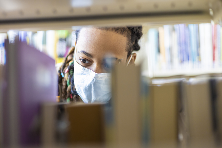 Young woman in the Library