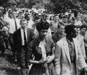 African American Student Followed by Crowd After School Enrolment