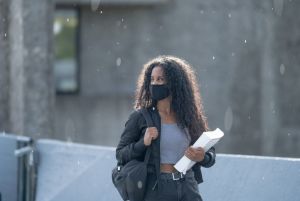 Female University Student Walking Outside on Campus