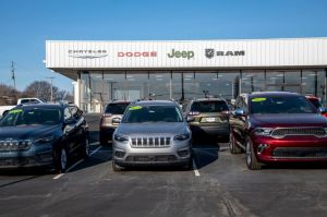 Lansing, Kansas. Car dealership lot displaying new 2021 vehicles on the lot.