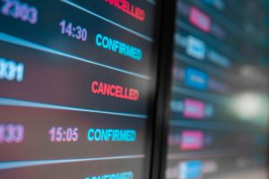 Departure flight board with cancelation at the Airport.