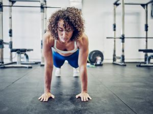 Woman Cross Training in a Gym