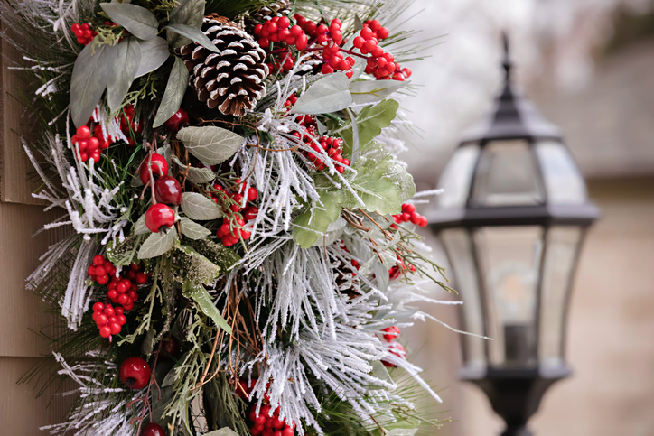 Frosted Christmas Outdoor Decorations with an Outdoor Coach Lamp in the background
