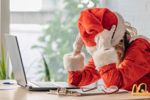 middle aged adult woman wearing santa claus costume