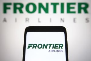 In this photo illustration, Frontier Airlines logo is seen...