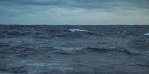 Rough sea and waves of the ocean from a boat