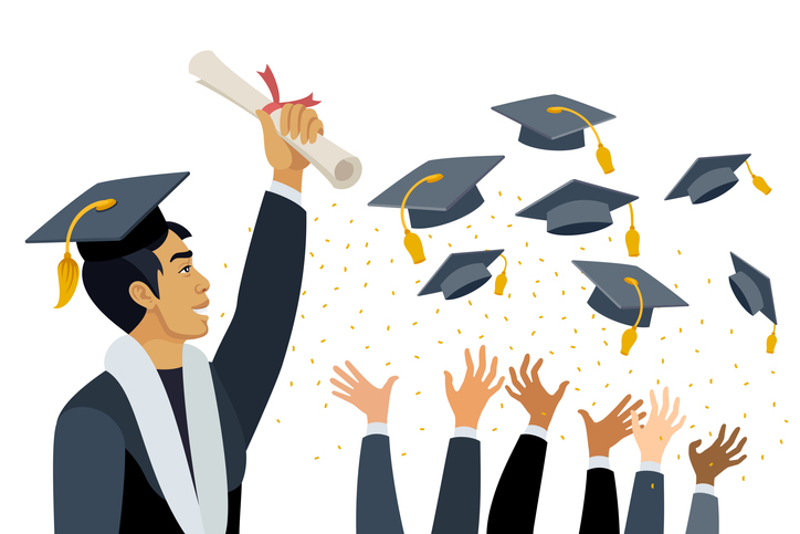 Young Asian Man at graduation. Students throw graduation caps in the air.