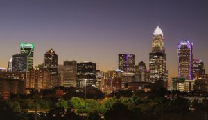 Aerial view of illuminated buildings against sky at night,Charlotte,North Carolina,United States,USA