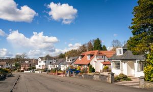 Residential street with detached houses