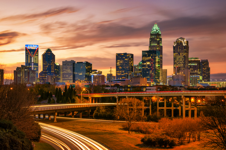 Charlotte Skyline At Sunset With Light Trails And Beautiful Cloudscape