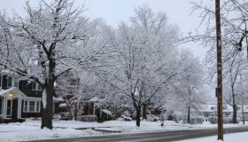 Residential street buried in snow after a blizzard storm