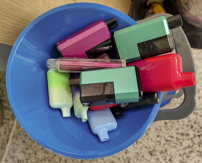 Recycled smoking vapes collected in rubbish bin at glasgow scotland england