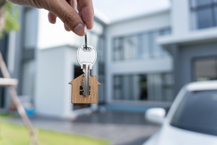 lease, rental and selling home. Real estate agent manager smile holding key for new owner. rent house, Sales, loan credit financial, insurance, Seller, dealer, installment, buy, sell, move in