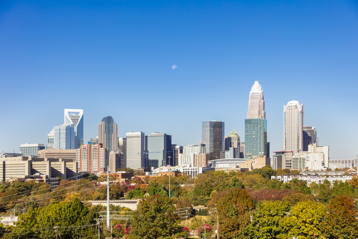 Charlotte North Carolina under a daytime moon