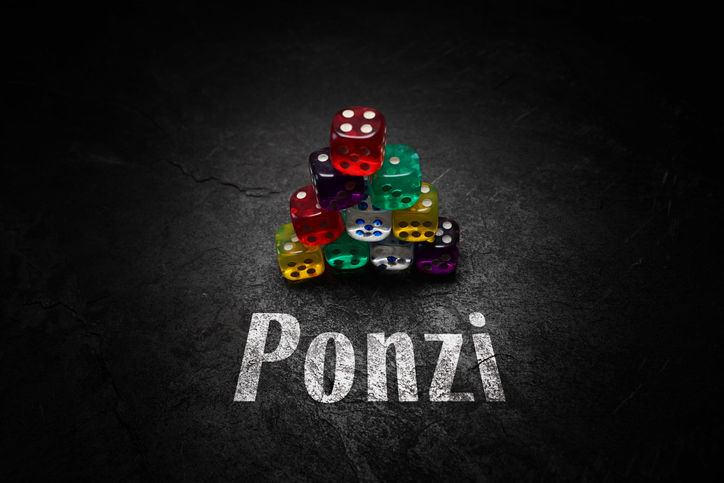 Colorful dice in a pyramid shape with Ponzi text on dark background