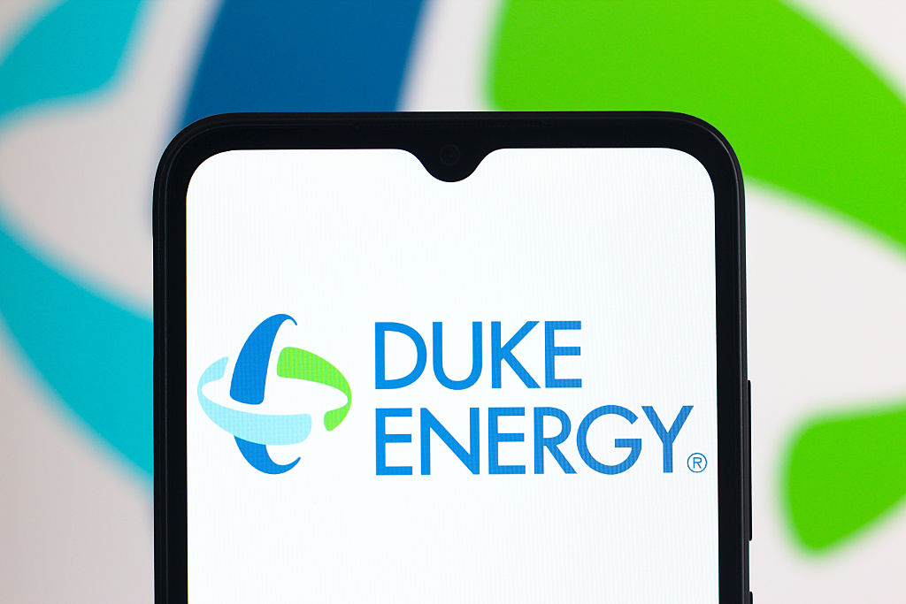 In this photo illustration, the Duke Energy logo is seen...