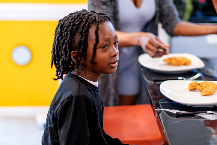Hungry boy ready to eat